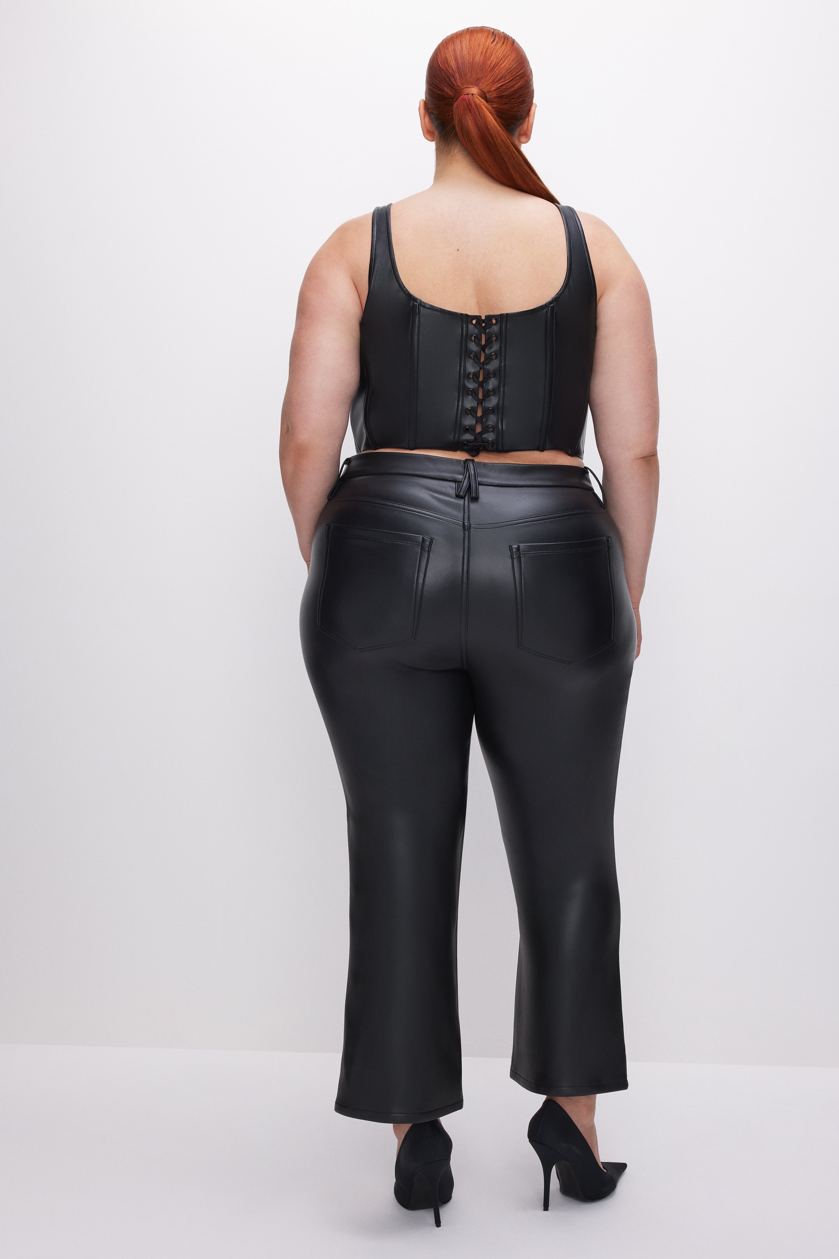GOOD AMERICAN Cropped Ankle-Length Vegan Leather Trousers | Slim-Fit Bootcut Pants in Classic Black 