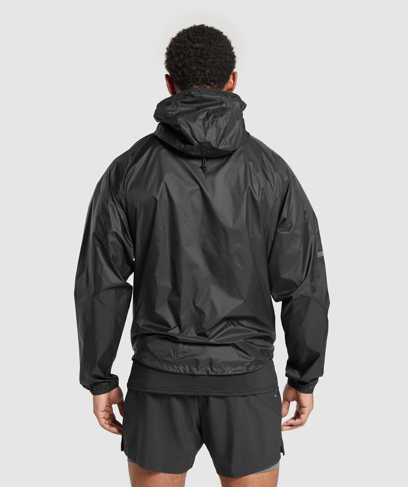 GYMSHARK WATER-RESISTANT BUDE PACKABLE JACKET - ONYX BLACK 