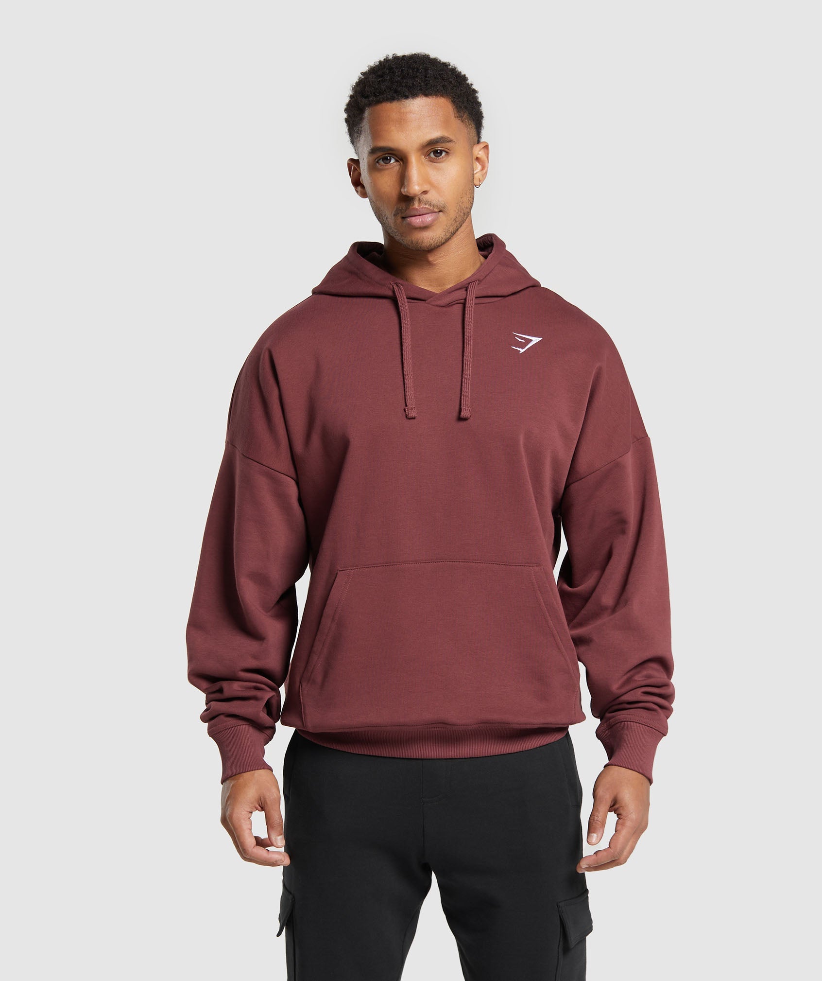 GYMSHARK Oversized Crest Hooded Sweatshirt in Rich Burgundy Brown Heather | Cozy Streetwear Essential with Relaxed Fit