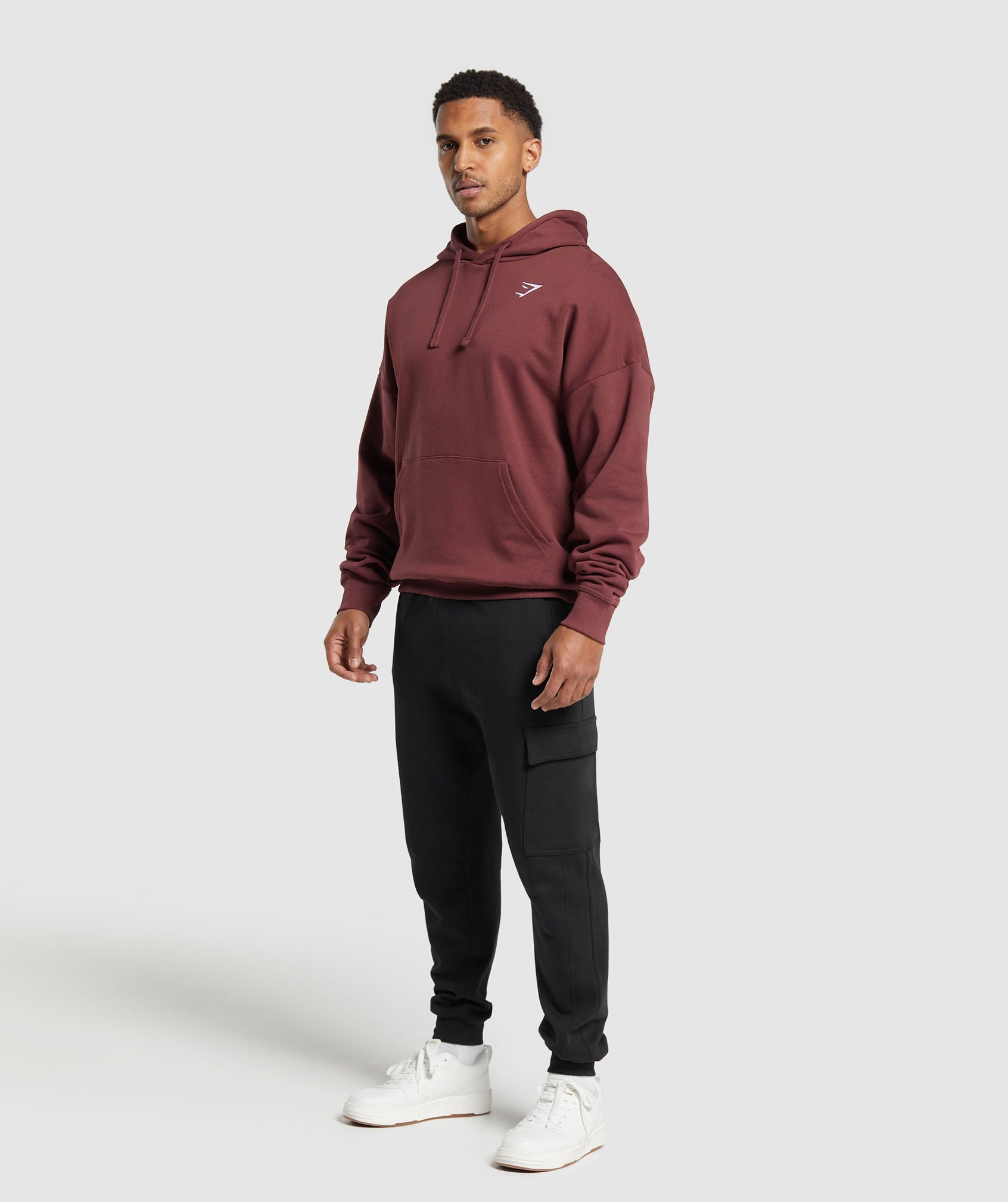 GYMSHARK Oversized Crest Hooded Sweatshirt in Rich Burgundy Brown Heather | Cozy Streetwear Essential with Relaxed Fit