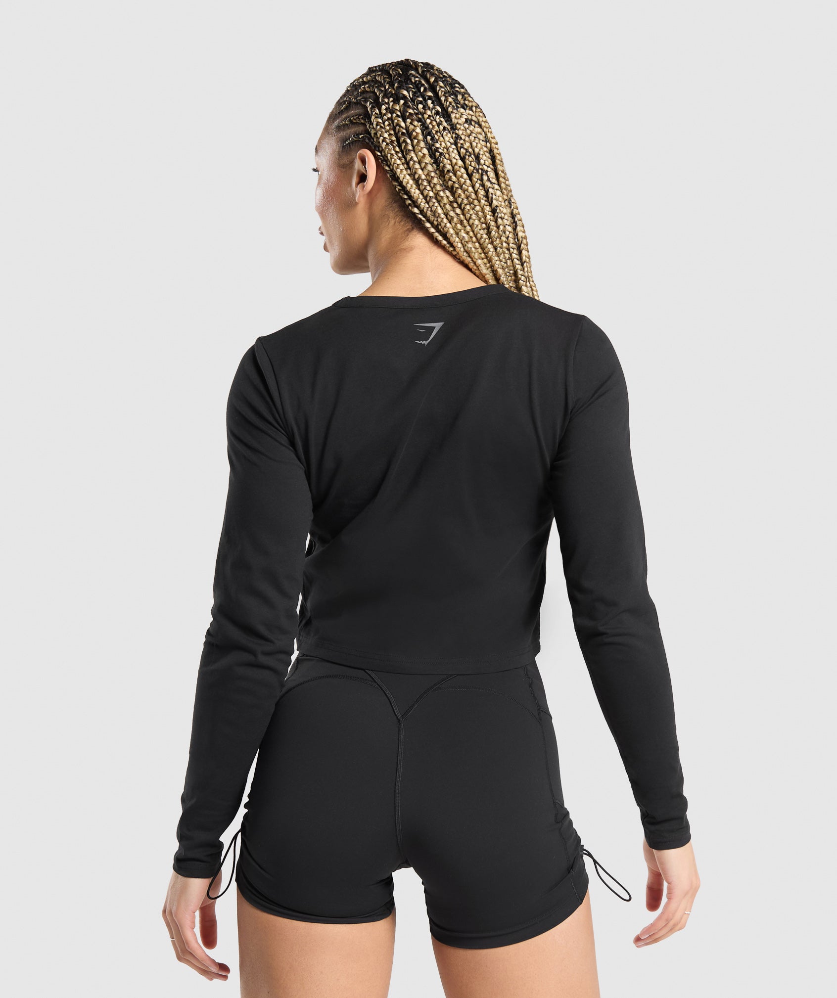 GYMSHARK Strength-Training Mid-Length Long-Sleeve Workout Shirt | Sleek Muscle-Building Top in Classic Black