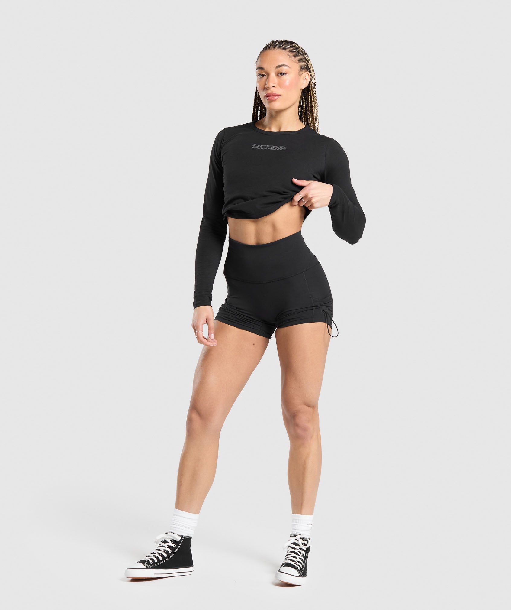GYMSHARK Strength-Training Mid-Length Long-Sleeve Workout Shirt | Sleek Muscle-Building Top in Classic Black