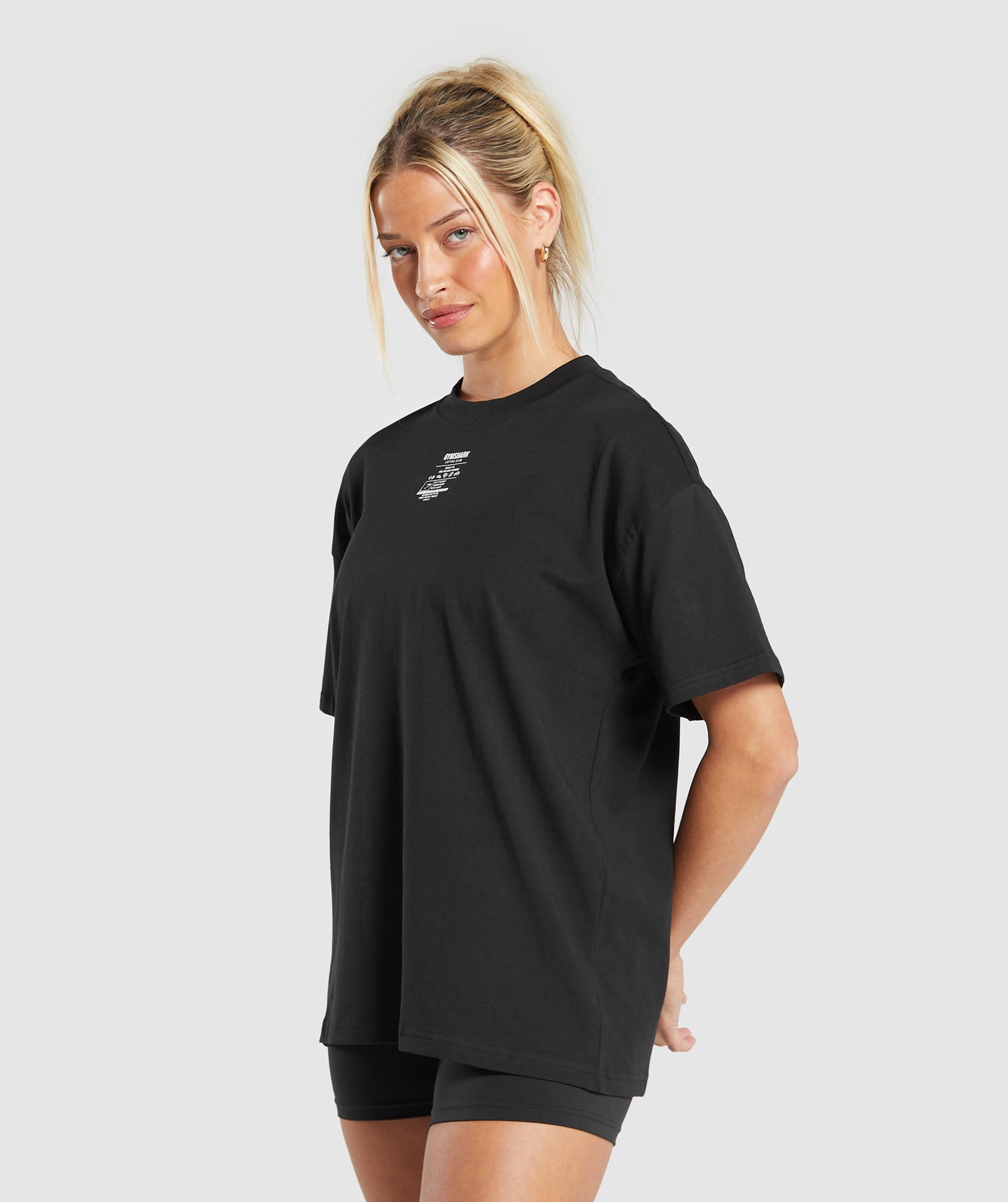 GYMSHARK Gymshark Vintage-Inspired Care Label Print Relaxed Fit Tee in Classic Black 