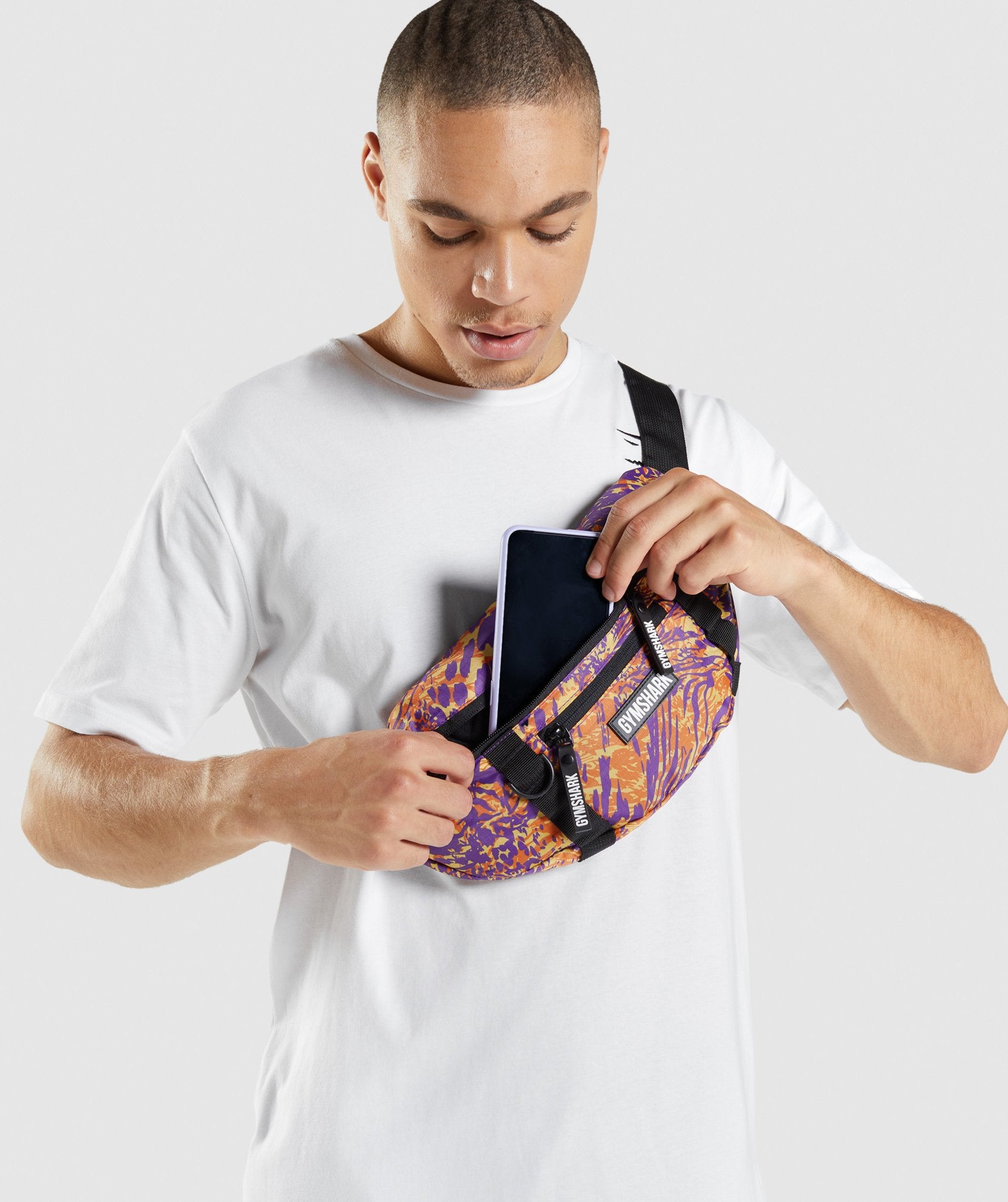 GYMSHARK Safari-Inspired Crossbody Bag with Vibrant Zebra Pattern - Bold Orange Design
