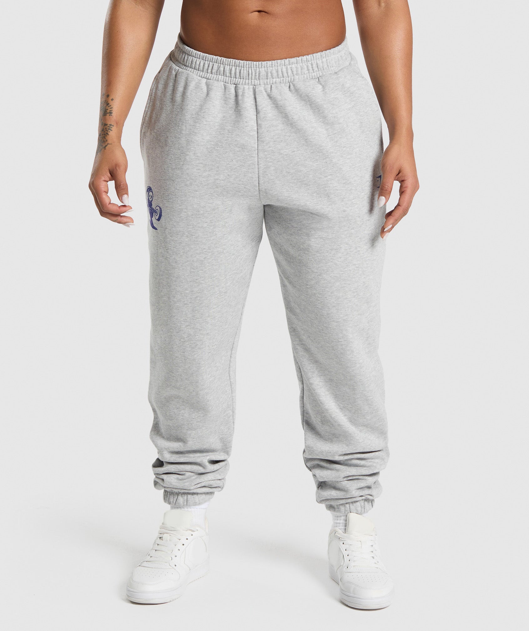 GYMSHARK Gymshark Reaper Graphic Relaxed-Fit Jogger Pants - Men's Casual Streetwear in Light Grey Marl 