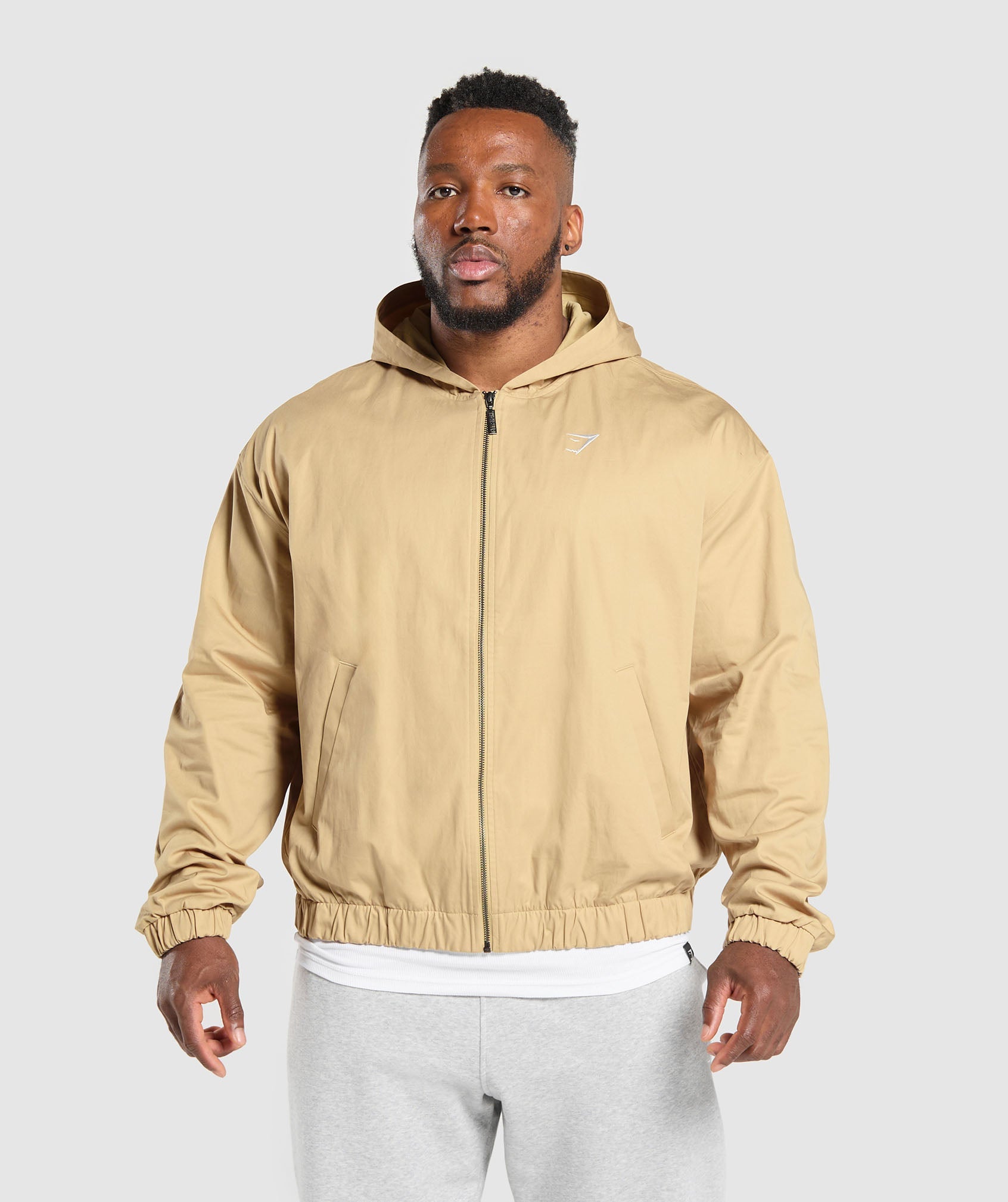 GYMSHARK Gymshark Relaxed-Fit Hooded Outerwear Jacket in Desert Taupe