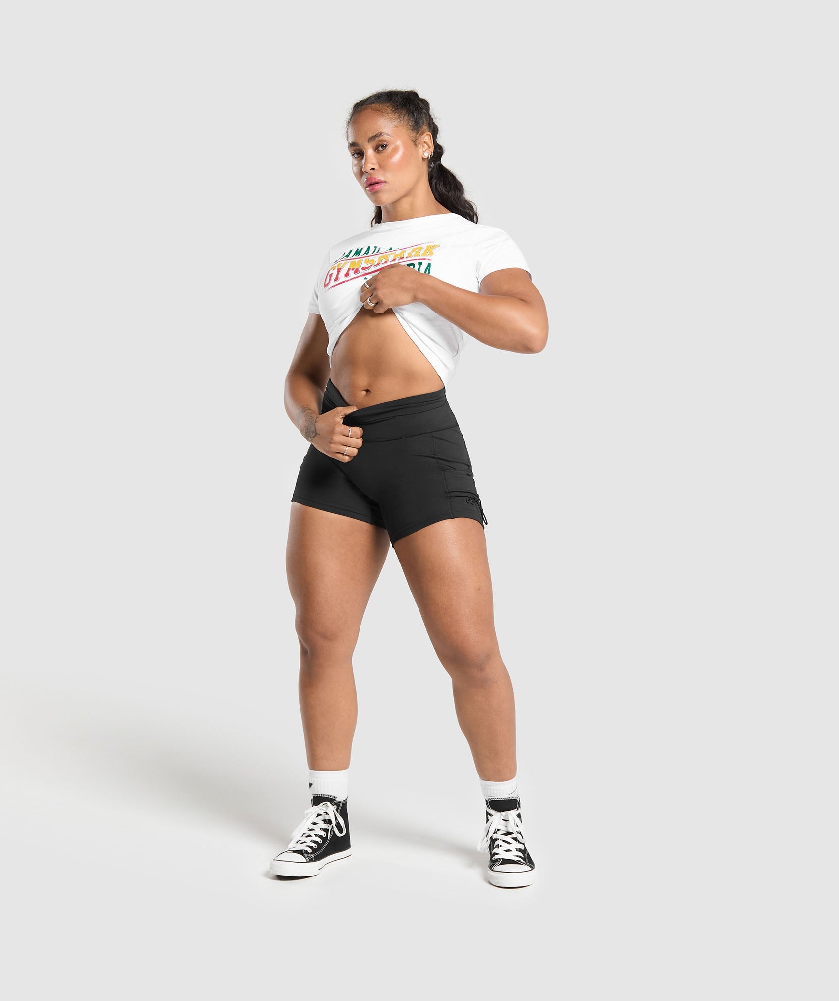 GYMSHARK - Gymshark Indiyah & Dami Collab Graphic-Printed Sleeveless Top in Crisp White 